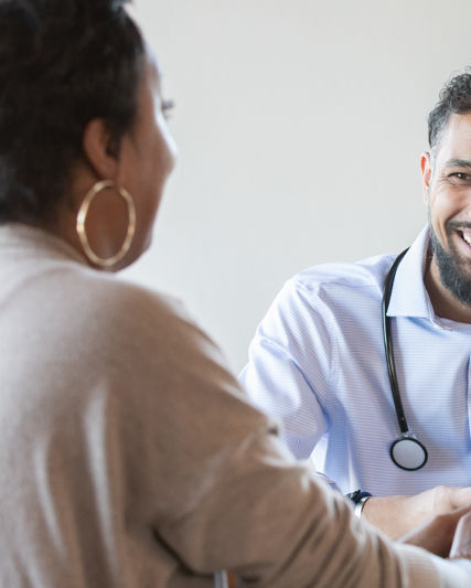 Doctor speaking to patient