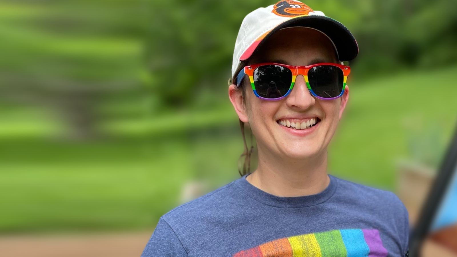 Female with rainbow glasses