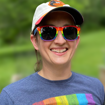 female with rainbow glasses 
