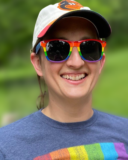 female with rainbow glasses 