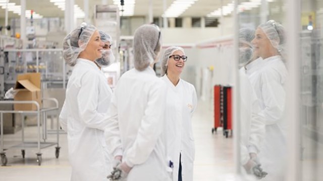 Three women scientists in a lab