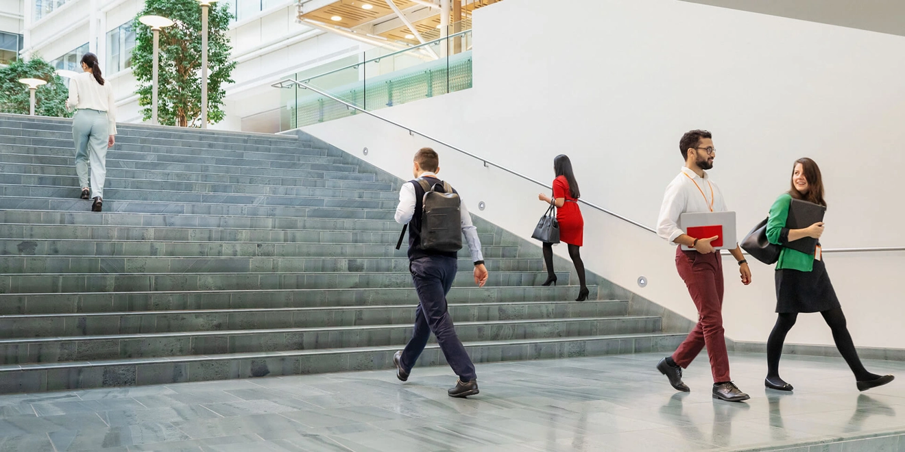 people walking up and down stairs