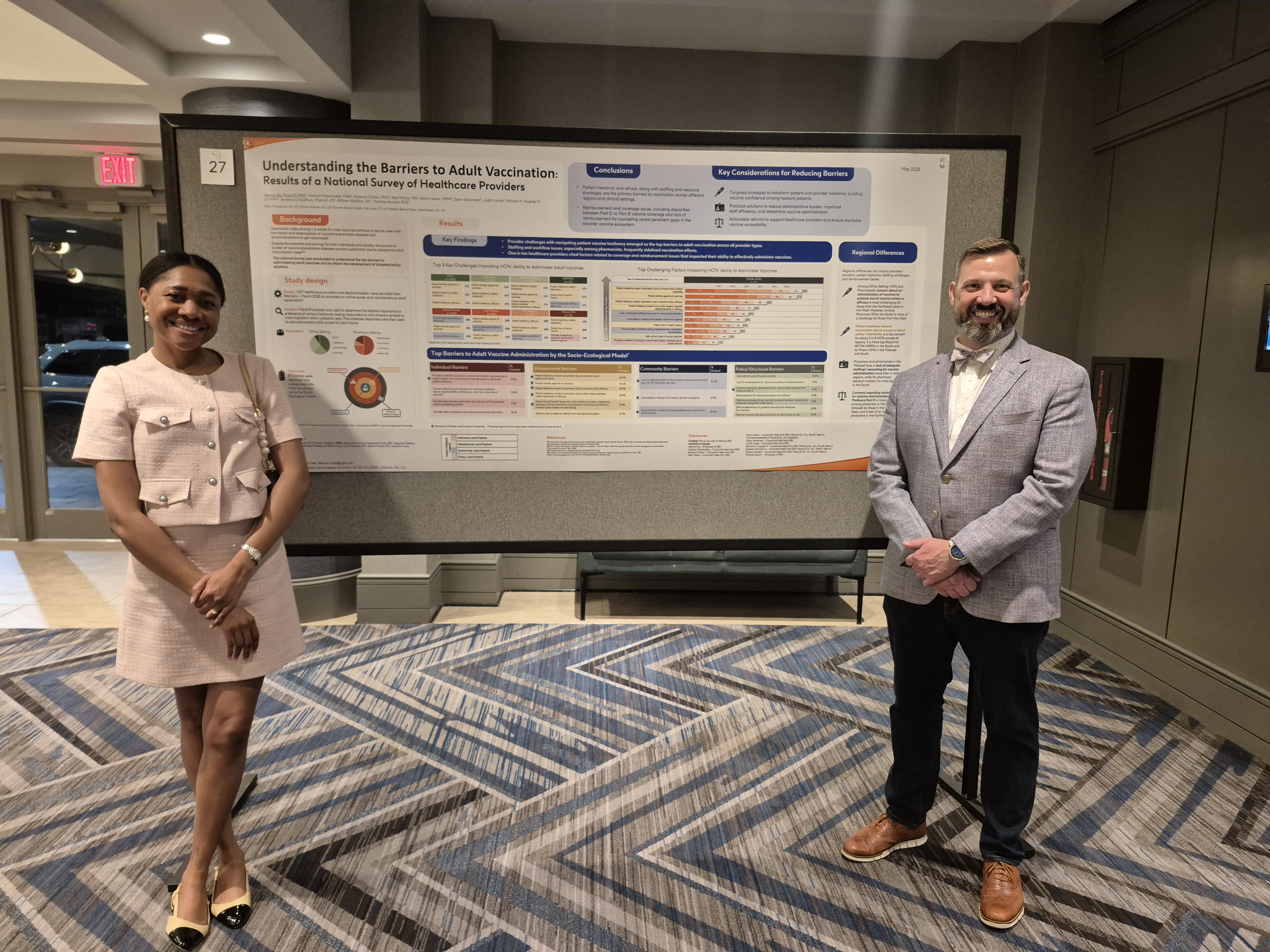Two colleagues presenting data 