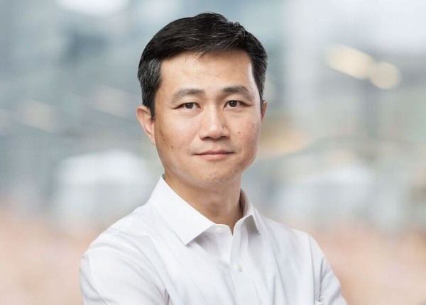 Photo of Asian male in business attire  