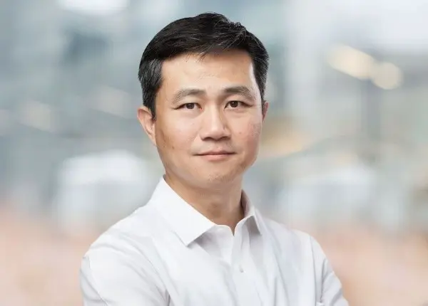 Photo of Asian male in business attire  