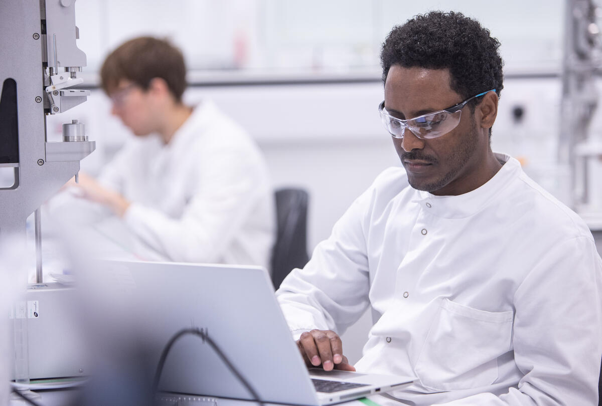 two people in a lab.