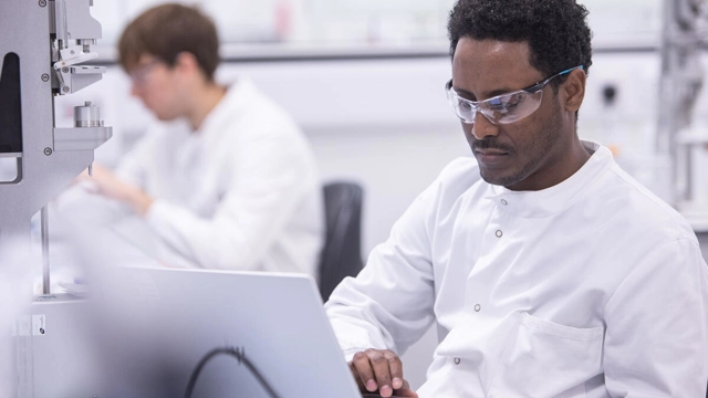 two people in a lab.