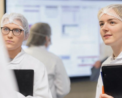 two scientist looking at date