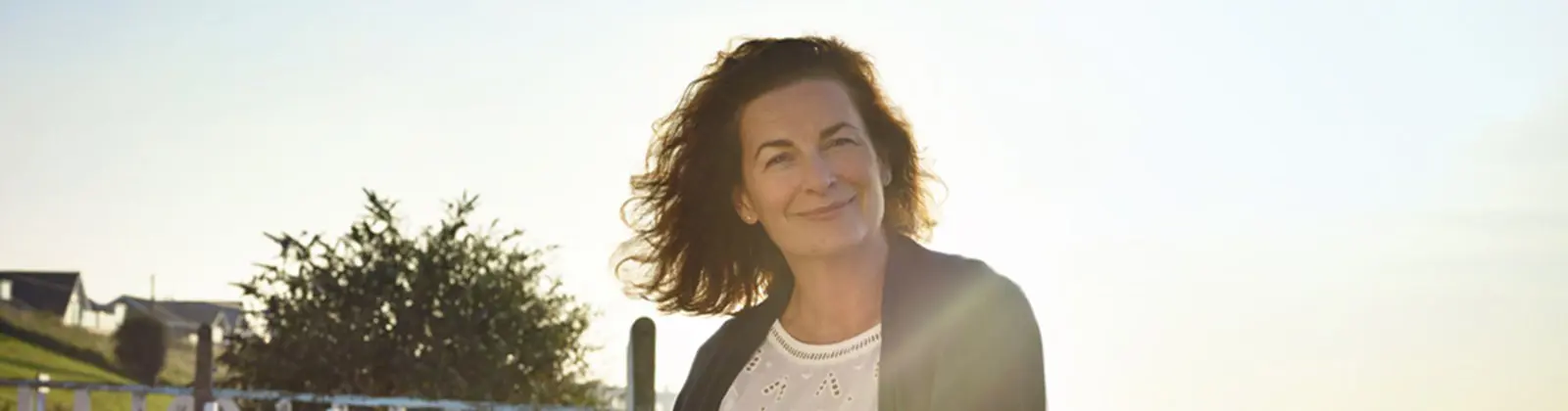 women looking at camera and smiling