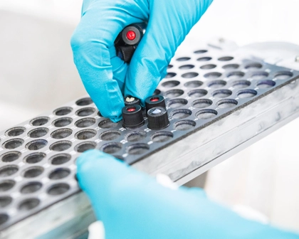 hands reaching for samples from a tray