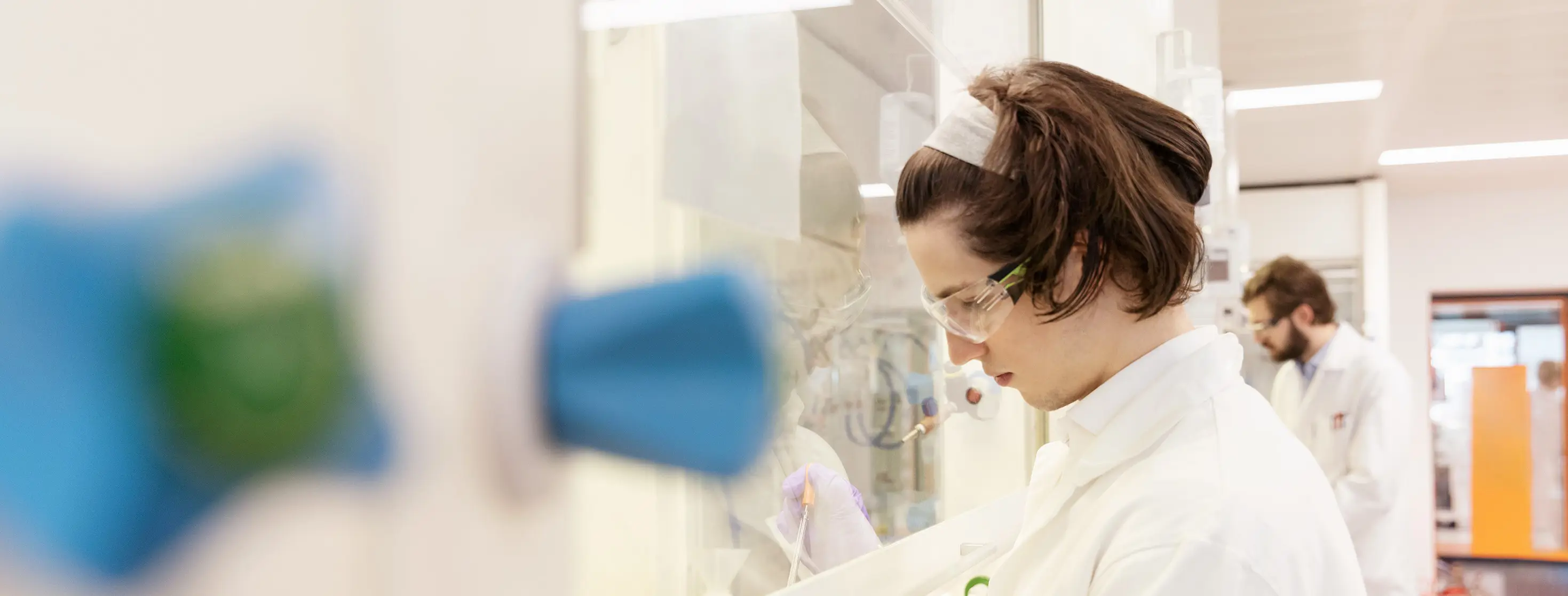 Female working in lab.