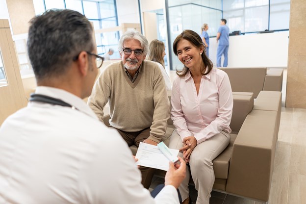 couple talking to a doctor