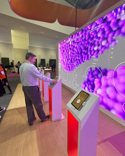 men in front of media station